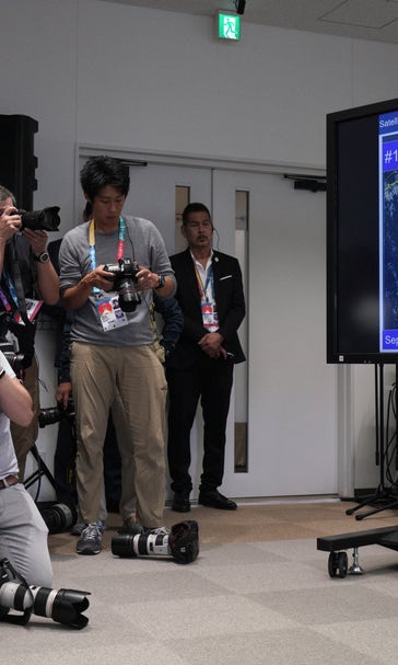 Tough guys: Rugby players not flustered by massive typhoon